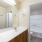 bathroom with a large mirror