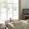 a living room with a tv and couches