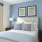 a bed with white pillows